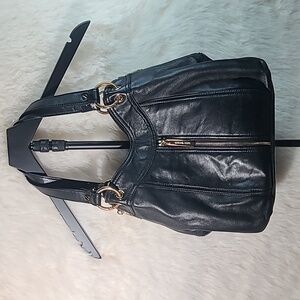 Michael Kors Moxley soft black leather shoulder bag with gold hardware. 